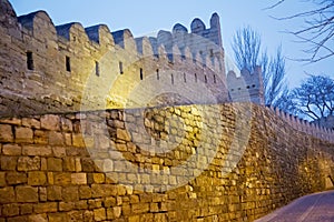 Icheri Sheher in Baku. Azerbaijan . Gate of the old fortress, entrance to night Baku old town. Baku, Azerbaijan. Walls of the Old