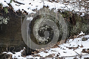 Icicle on rock face