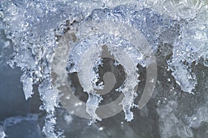 Icicles covered with hoarfrost