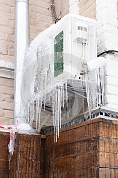 icicles hanging from the air conditioner close-up