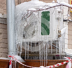 icicles hanging from the air conditioner close-up