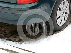 Icicles hanging from a car