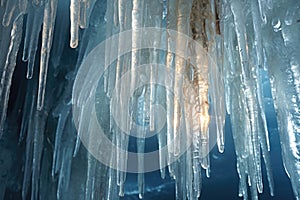 Icicles hanging from the ceiling of a cave. Perfect for winter or nature-themed designs