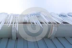 Icicles hanging down from the gutter
