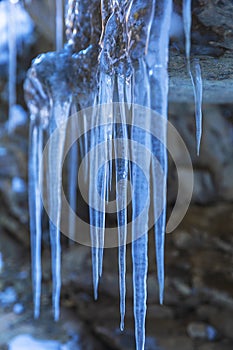 Icicles hanging on the rocks in the gorge
