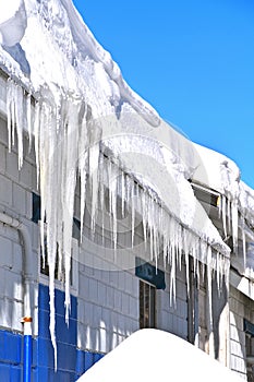 Icicles hanging from a roof