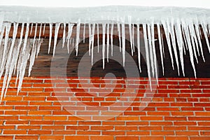 Icicles lump above the window