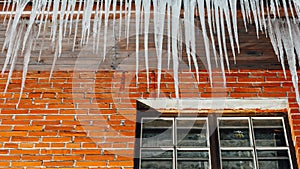 Icicles lump above the window