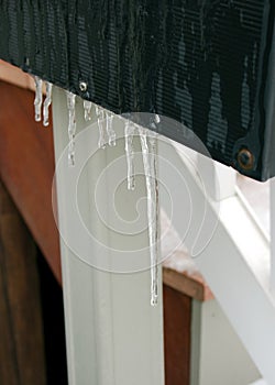 Icicles hang from a mailbox