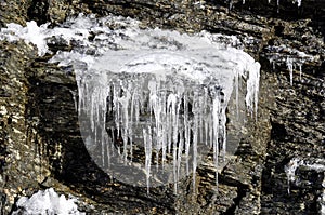 Icicles on rock