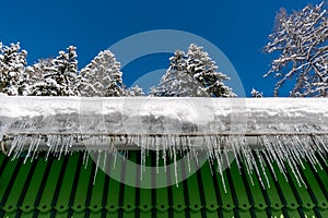 Icicles on the roof of the house