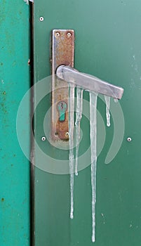 Icicles on a unused metal door knob