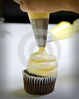 Icing the cupcake