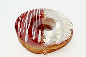 Icing powdered confectioners' sugar and Strawberry flavored ring donut, A glazed, yeast raised, American style ring doughnut