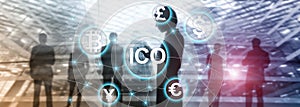 ICO - Initial coin offering, Blockchain and cryptocurrency concept on blurred business building background.