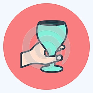 Icon Holding Wine Goblet. suitable for Hand Actions symbol. color mate style. simple design editable. design template vector.