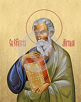 Icon of the Matthew the Evangelist on a Golden background photo