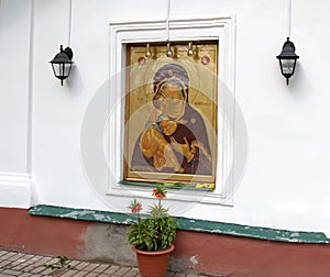 Icon of the Mother of God  `Skill` on the facade of St. Michael`s Cathedral. Holy Assumption Pskov-Pechersky Monastery. Pechory, P