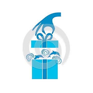 Icon Surprise. Sea as a gift. Hand opens a gift box with dolphins jumping out of it.