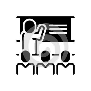 Black solid icon for Taught, literate and trained photo