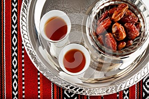 Iconic Abrian fabric tea and dates symbolise Arabian hospitality