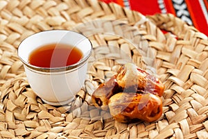 Iconic Abrian fabric tea and dates symbolise Arabian hospitality