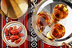 Iconic Abrian fabric tea and dates symbolise Arabian hospitality