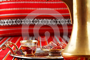 Iconic Abrian fabric tea and dates symbolise Arabian hospitality