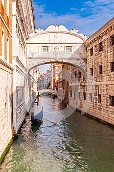 Iconic Bridge of Sighs and a gondolier in Venice in Veneto, Italy