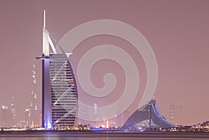 Iconic Burj Al Arab Hotel and the adjacent Jumeirah Colony. Night scene