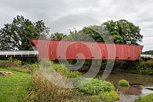 The iconic Hogback Covered Bridge spanning the North River, Winterset, Madison County, Iowa