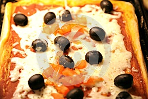 Iconic Italian food: pizza with black olives