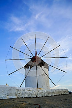 Iconic landmark white old windmills of Mykonos island with blue sky background at Chora