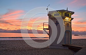 The iconic life guard tower on the Main Beach of Laguna Beach, California. photo