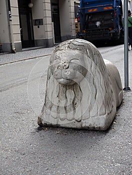 iconic lion statue main shopping street Drottninggatan in Stockholm, Sweden, Europe