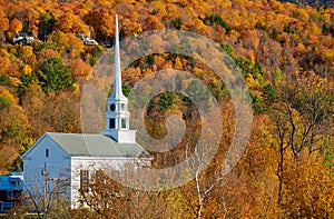 Iconic New England church in Stowe town at autumn