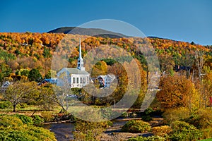 Iconic New England church in Stowe town at autumn