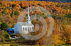 Iconic New England church in Stowe town at autumn