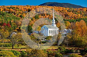 Iconic New England church in Stowe town at autumn