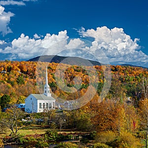 Iconic New England church in Stowe town at autumn