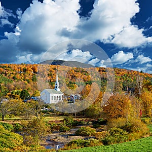 Iconic New England church in Stowe town at autumn