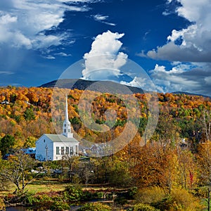 Iconic New England church in Stowe town at autumn