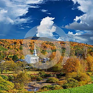 Iconic New England church in Stowe town at autumn