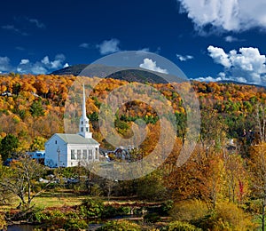 Iconic New England church in Stowe town at autumn