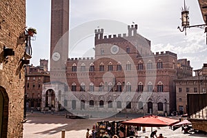 The iconic Palazzo Pubblico at the Piazza del Campo in downtown Siena