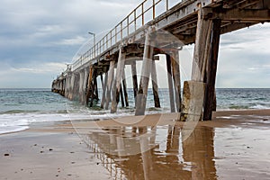 The iconic Port Noarlunga Jetty and its reflection in the water