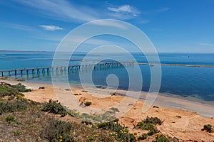 The iconic port noarlunga jetty and reef at low tide on a calm sunny day in South Australia on November 2 2020