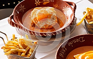 The iconic Portuguese French Sandwich also known as `Francesinha Especial`, Braga. photo