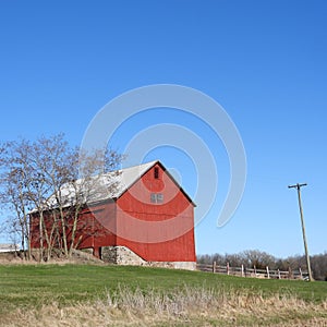 Iconic gable roof red wood barn in the FingerLakes NYS