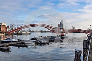 The iconic red Python Bridge (Pythonbrug) Amsterdam.